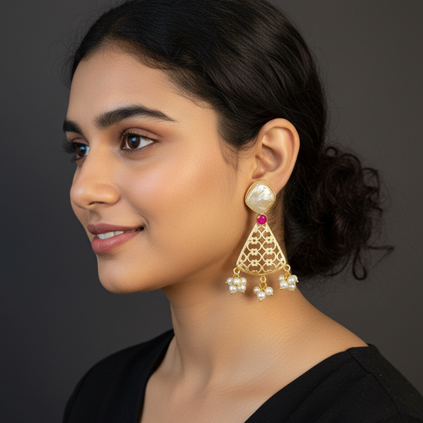 Woman wearing lumibella's Golden Dangler Earrings With Uncut Pearl
