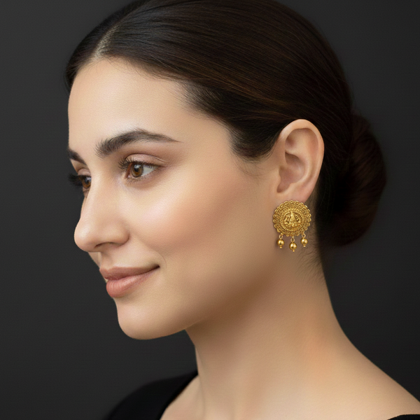 women wearing lumibella's Golden Pearl Lakshmi Round Earrings
