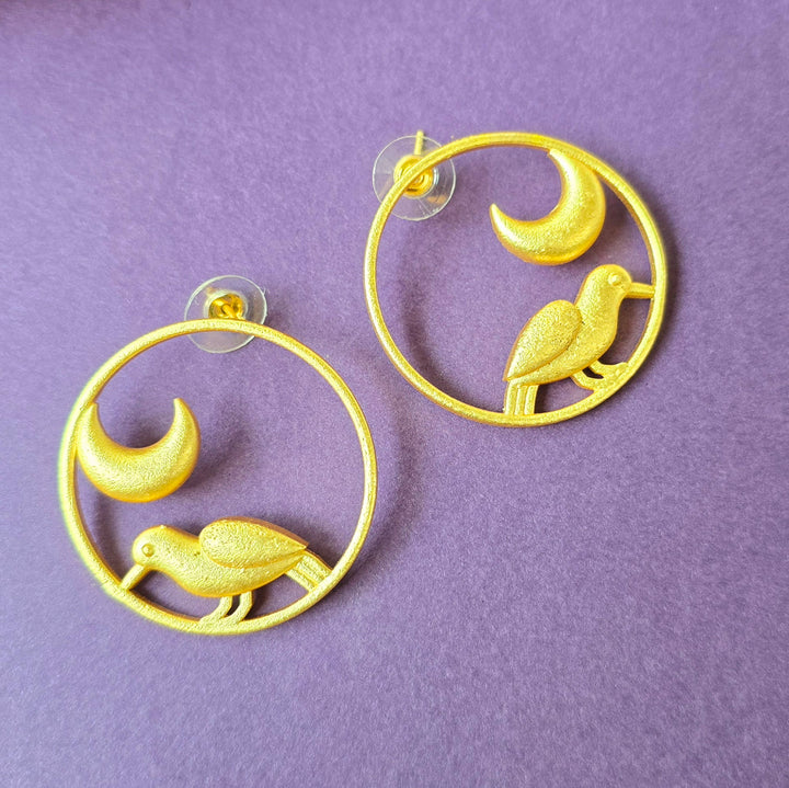 Gold round earrings with birds