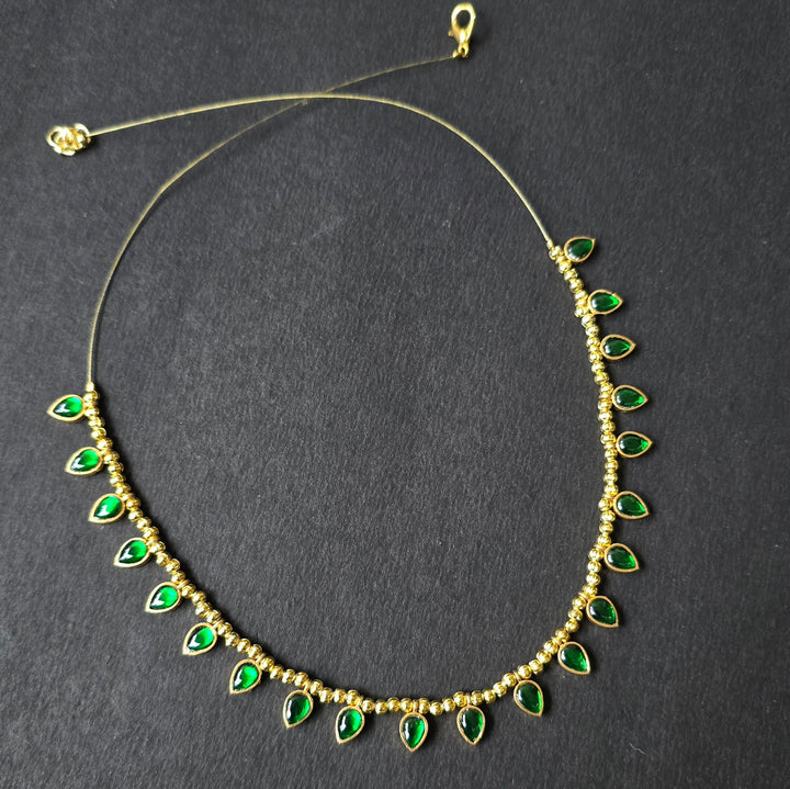 Green Invisible Chain With Golden Pearls