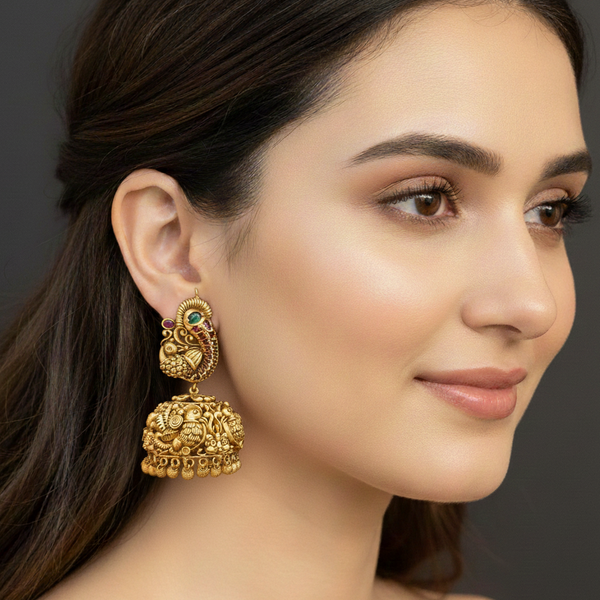 women wearing lumibella's Heavy Temple Peacock Style Large Jhumka Earrings. 