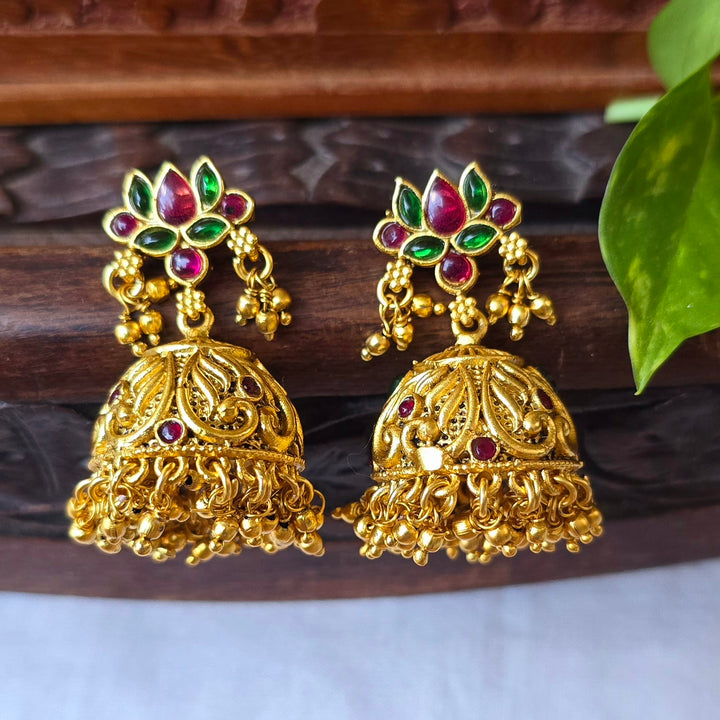 Golden pearl jhumka earrings