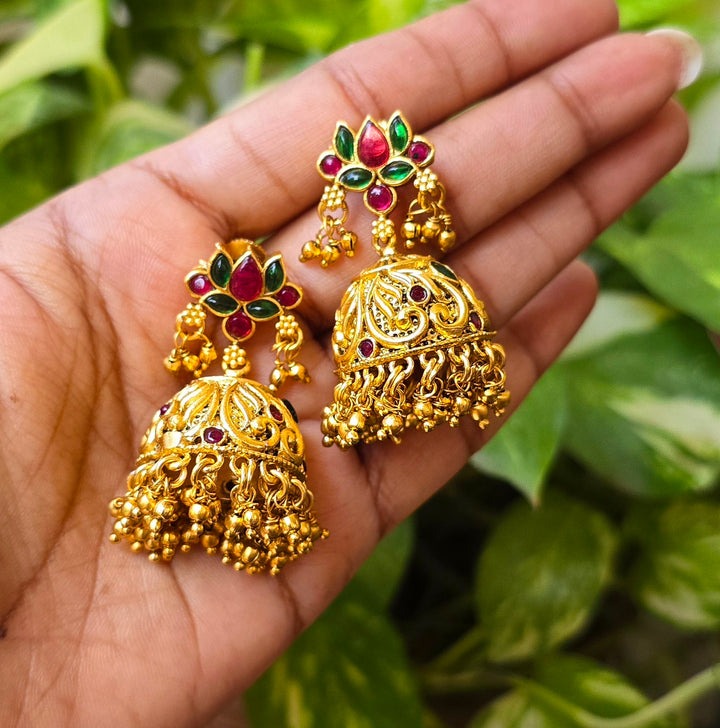 Golden pearl jhumka earrings