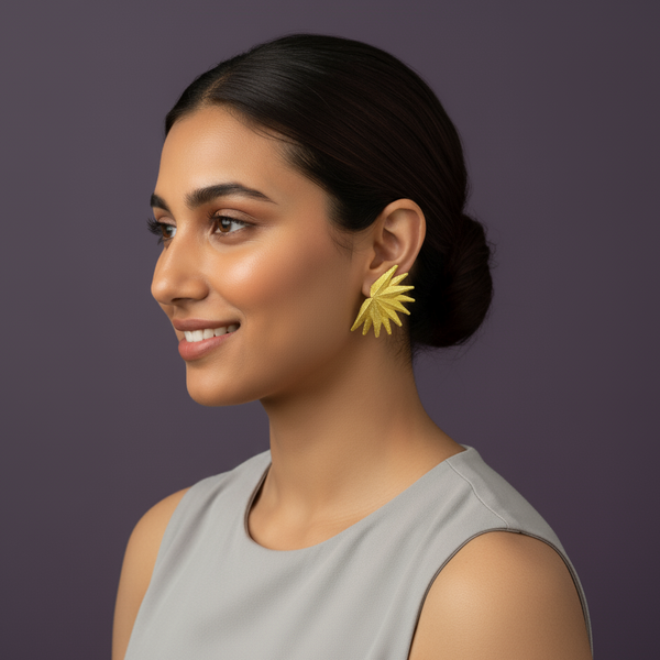 Woman wearing lumibella's Rustic half circle statement earrings. 