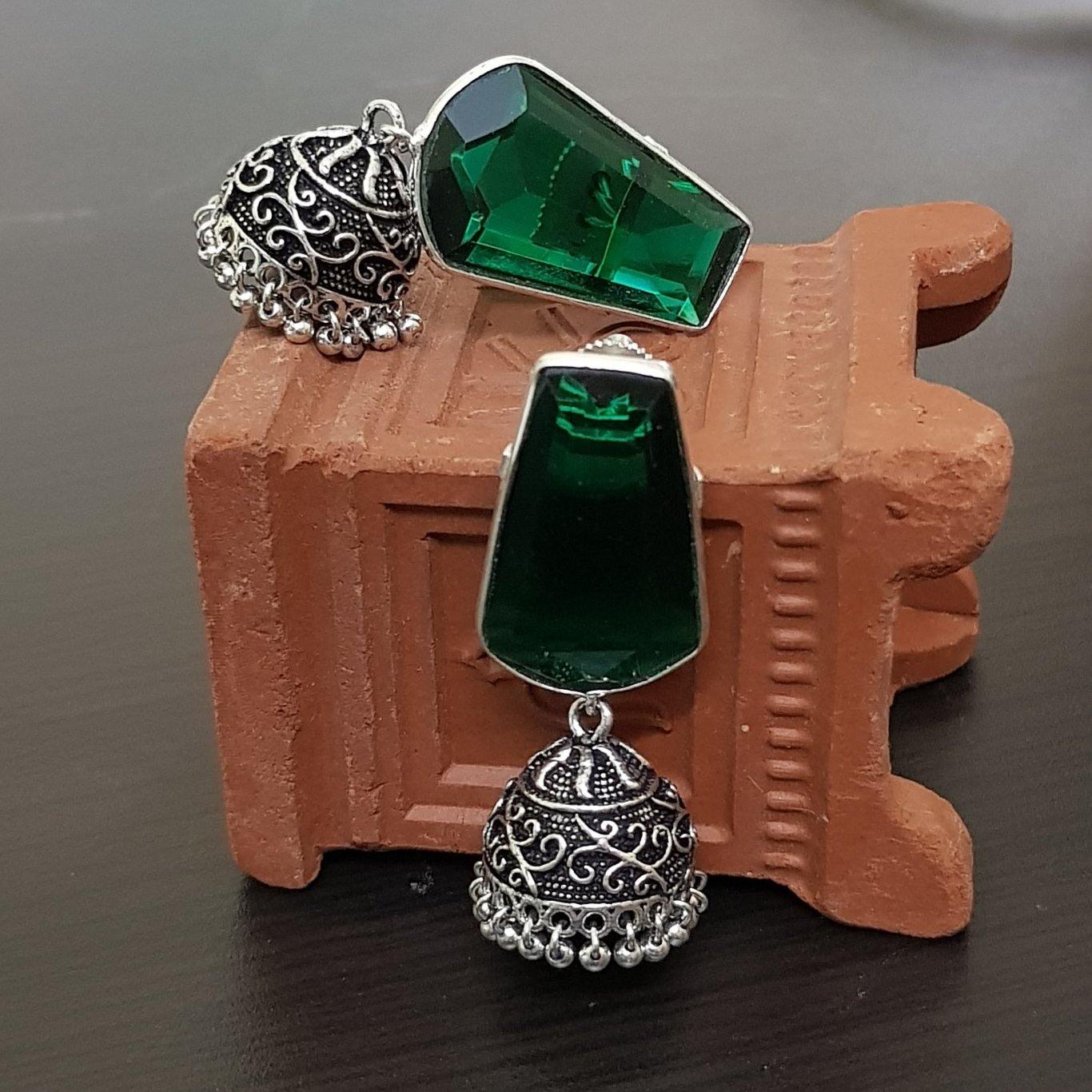 Green Stone Embellished German silver jhumka earrings with Gungurus - LumibellaFashion