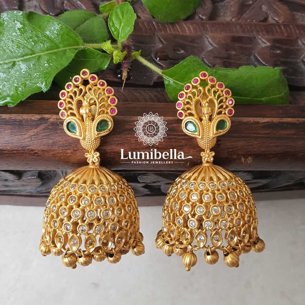 Teeming Royalty Antique Gold Jhumka Earrings